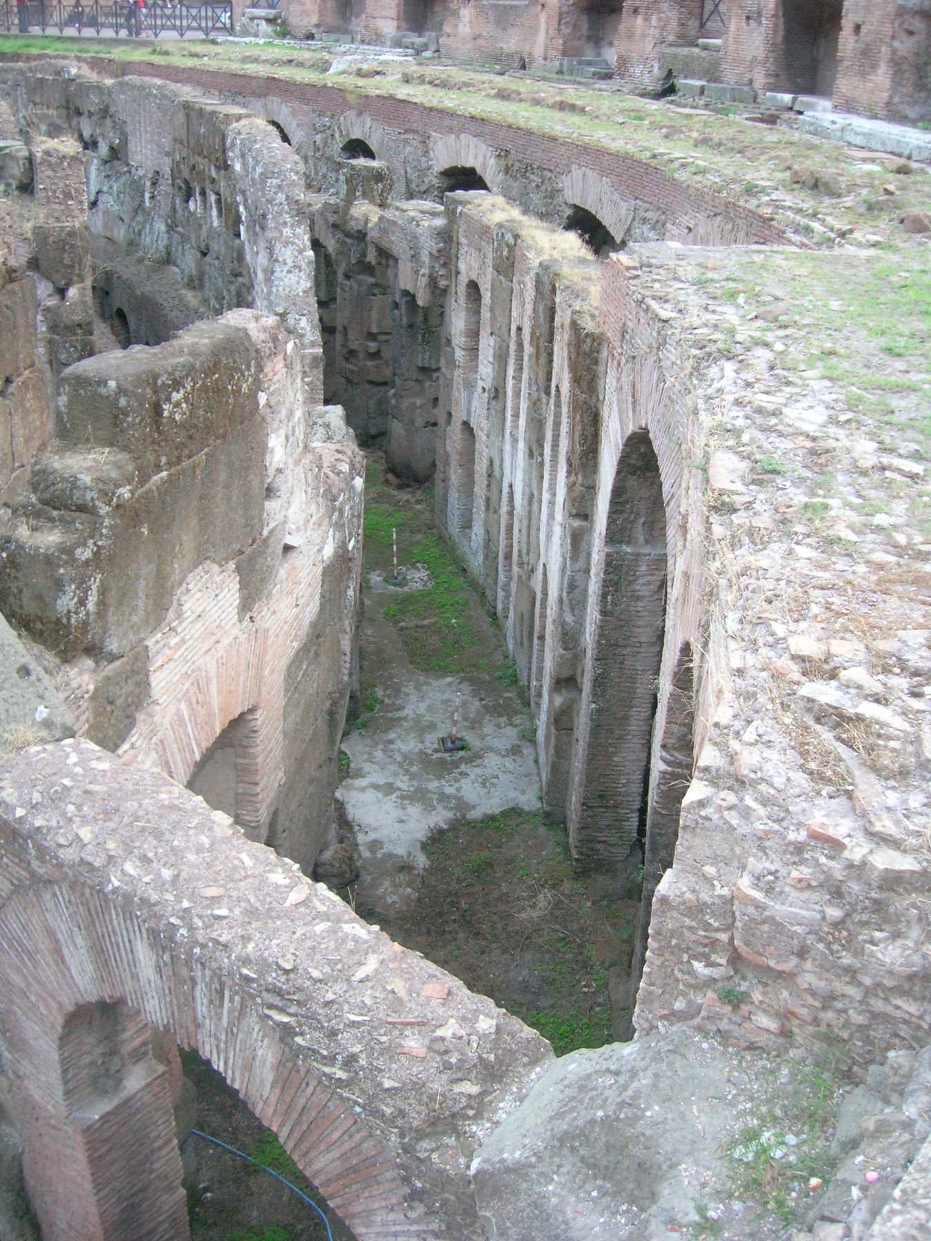 The exposed underground hypogeum of the Colosseum, a maze of brick chambers and corridors that once lay beneath the wooden arena floor.